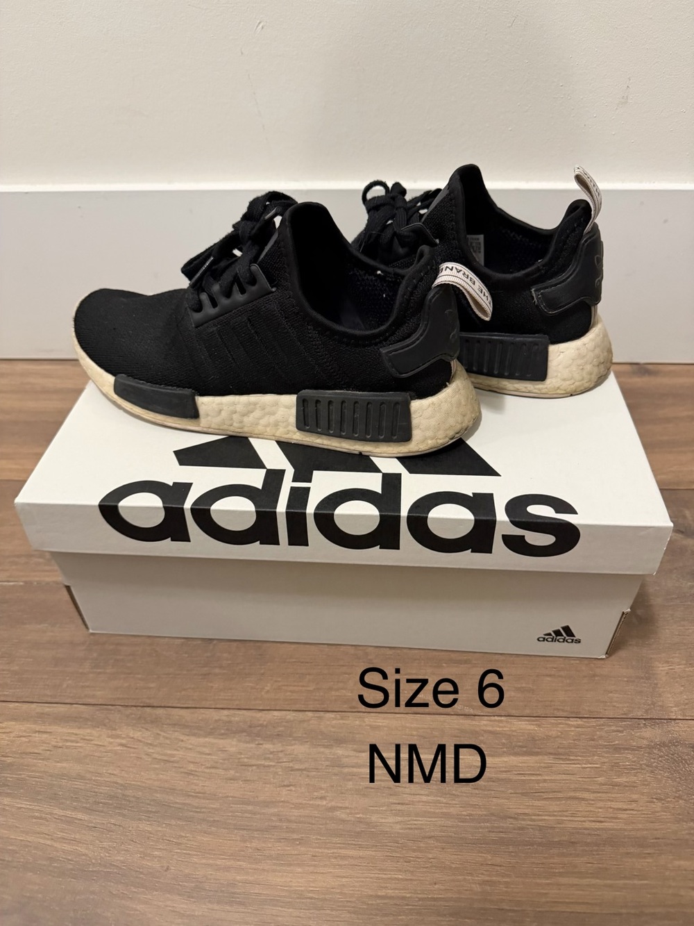 adidas woman NMD Sneakers in Black with Cream Midsole